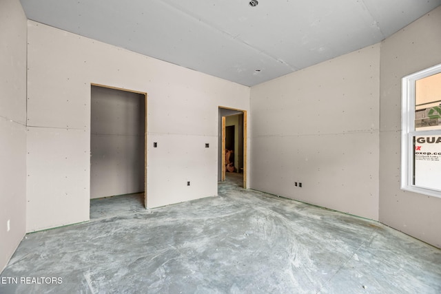 7624 Drake Ln, Knoxville, TN 37924 - unfurnished bedroom with concrete floors