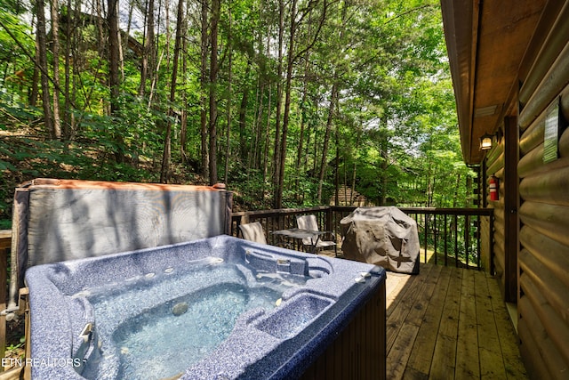 719 Kings Hills Blvd, Pigeon Forge, TN 37863 - wooden deck with a hot tub