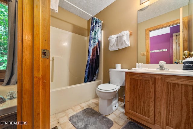 719 Kings Hills Blvd, Pigeon Forge, TN 37863 - full bath featuring vanity, a textured ceiling, shower / tub combo with curtain, and tile patterned floors