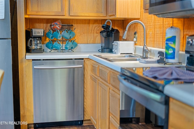 719 Kings Hills Blvd, Pigeon Forge, TN 37863 - kitchen with dishwasher, range, and light countertops