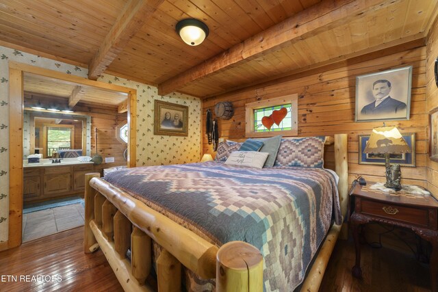 2389 Misty Ln, Sevierville, TN 37876 - bedroom with light wood-style floors, multiple windows, a wooden ceiling with exposed beams, and wood walls