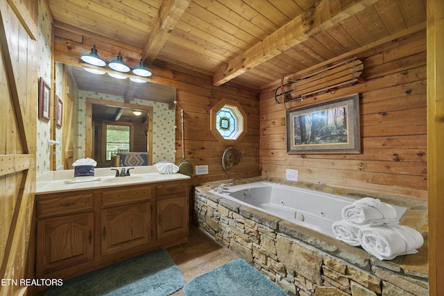 2389 Misty Ln, Sevierville, TN 37876 - bathroom with tile patterned flooring, vanity, a jetted tub, a wood ceiling with exposed beams, and wood walls