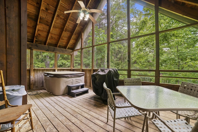 2389 Misty Ln, Sevierville, TN 37876 - sunroom featuring a ceiling fan, outdoor dining space, a jacuzzi, and healthy amount of natural light