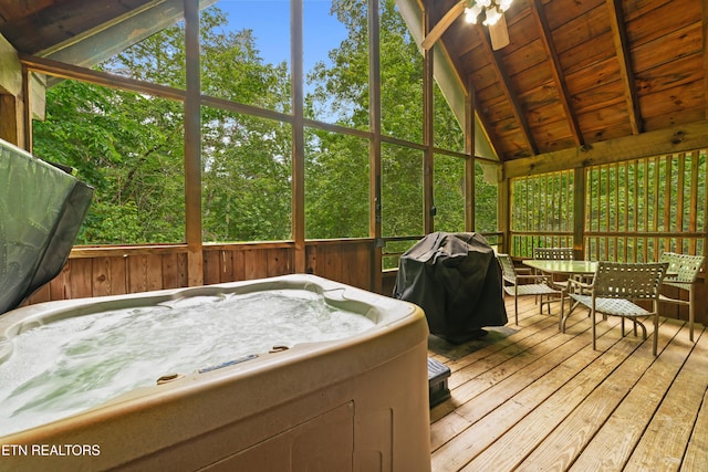 2389 Misty Ln, Sevierville, TN 37876 - sunroom / solarium featuring a jacuzzi, outdoor dining area, and ceiling fan