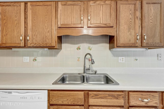 1670 Maremont Rd, Knoxville, TN 37918 - kitchen with white dishwasher, light countertops, and tasteful backsplash