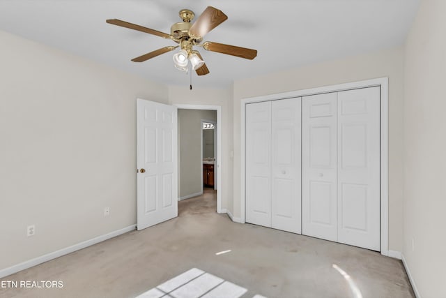 1670 Maremont Rd, Knoxville, TN 37918 - unfurnished bedroom featuring carpet, a closet, and a ceiling fan