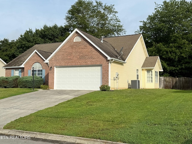 1670 Maremont Rd, Knoxville, TN 37918 - traditional-style home featuring an attached garage, concrete driveway, brick siding, and roof with shingles