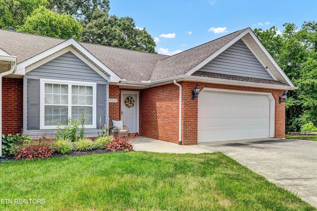 8824 Carriage House Way, Knoxville, TN 37923 - single story home with a shingled roof, brick siding, driveway, and an attached garage