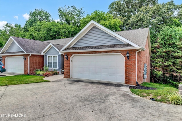 8824 Carriage House Way, Knoxville, TN 37923 - ranch-style house with an attached garage, brick siding, concrete driveway, and roof with shingles