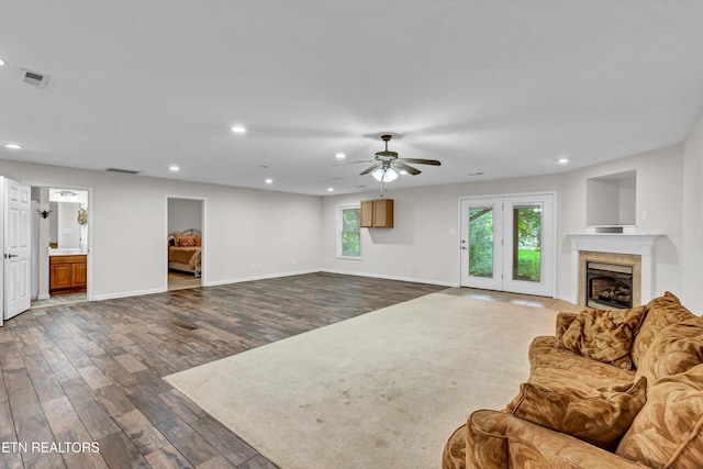 8824 Carriage House Way, Knoxville, TN 37923 - living area with dark wood-type flooring, recessed lighting, ceiling fan, and a tile fireplace