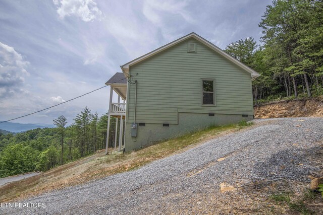 2609 Mountain Blvd, Sevierville, TN 37876 - view of property exterior featuring crawl space and a forest view