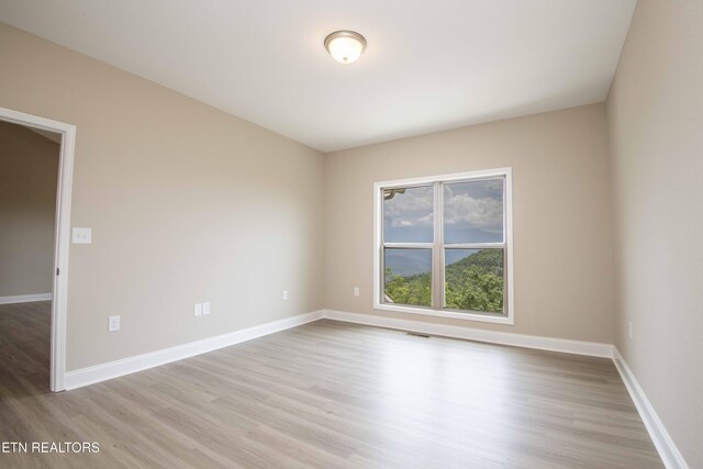 2609 Mountain Blvd, Sevierville, TN 37876 - spare room with light wood-style floors and baseboards