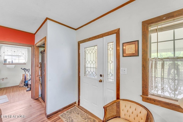 225 Spring St, Spring City, TN 37381 - entryway with light wood-style flooring and crown molding