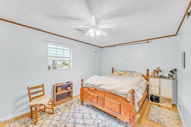 225 Spring St, Spring City, TN 37381 - bedroom featuring ornamental molding, a textured ceiling, wood finished floors, and ceiling fan
