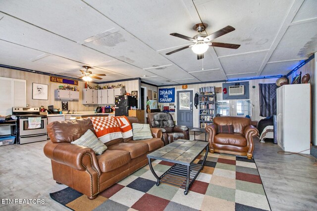 1096 Circle Dr, Jamestown, TN 38556 - living area with ceiling fan, light floors, and a wall mounted air conditioner
