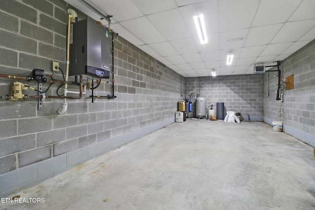 41 Crest Pl, Monterey, TN 38574 - basement featuring a paneled ceiling and concrete block wall