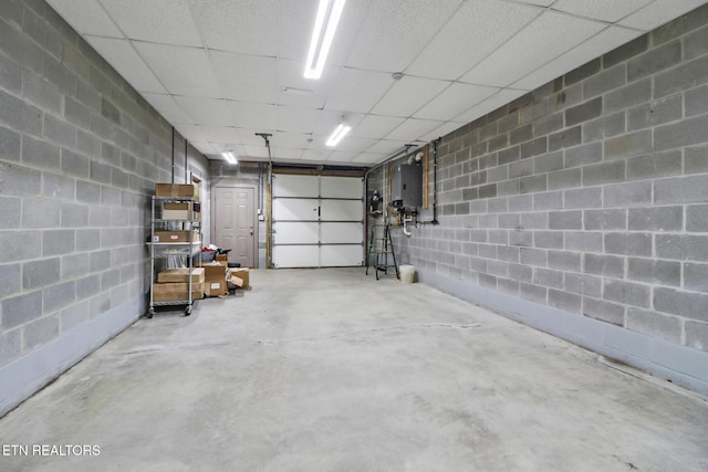 41 Crest Pl, Monterey, TN 38574 - garage with concrete block wall and water heater