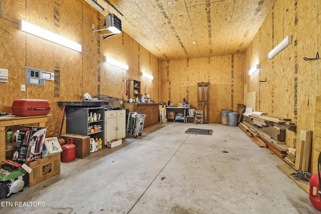 41 Crest Pl, Monterey, TN 38574 - miscellaneous room featuring unfinished concrete floors and a workshop area