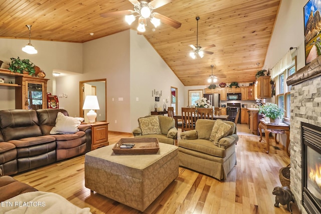 41 Crest Pl, Monterey, TN 38574 - living room with a ceiling fan, high vaulted ceiling, plenty of natural light, a fireplace, and light wood-style floors