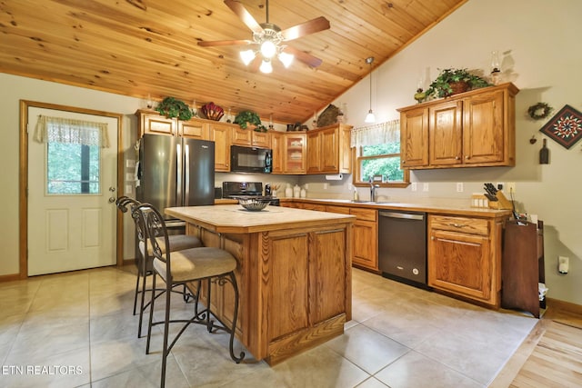 41 Crest Pl, Monterey, TN 38574 - kitchen featuring black microwave, dishwashing machine, vaulted ceiling, wooden ceiling, and light countertops