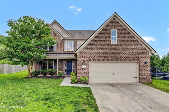 2017 Gusty Wind Ln, Knoxville, TN 37932 - view of front of property with brick siding, concrete driveway, and an attached garage