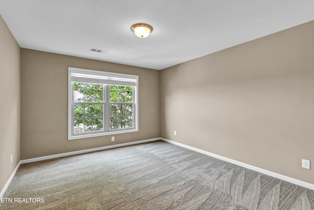 2017 Gusty Wind Ln, Knoxville, TN 37932 - spare room featuring baseboards and carpet floors