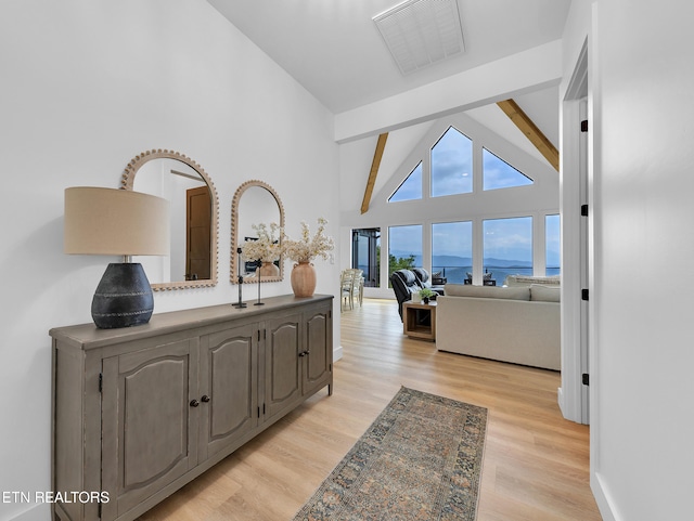 1848 Mountain Ash Way, Sevierville, TN 37876 - hall with high vaulted ceiling, light wood-type flooring, beam ceiling, and a water view