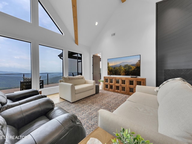 1848 Mountain Ash Way, Sevierville, TN 37876 - living room featuring high vaulted ceiling, beam ceiling, wood finished floors, and recessed lighting