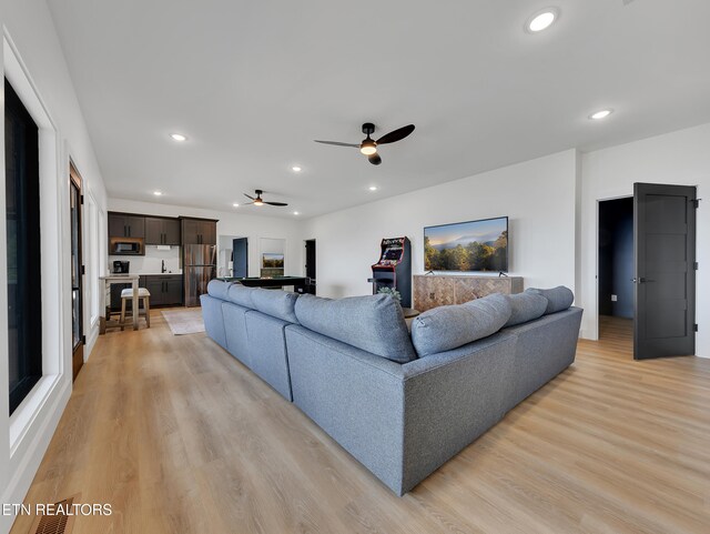 1848 Mountain Ash Way, Sevierville, TN 37876 - living room featuring ceiling fan, light wood-style floors, and recessed lighting