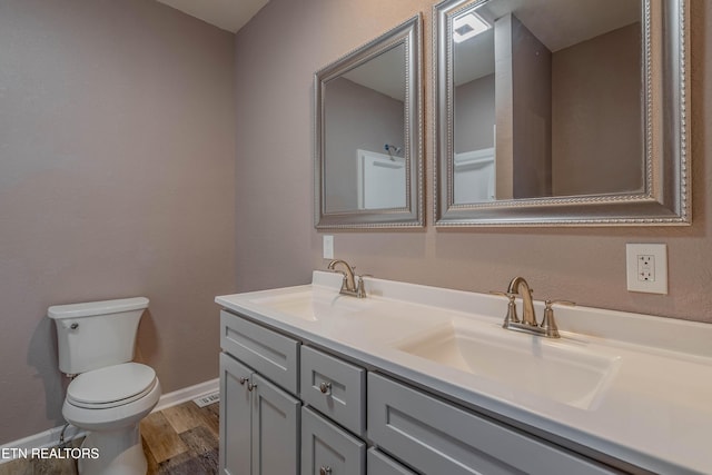 150 Ray Cross Rd, Harriman, TN 37748 - bathroom with double vanity and wood finished floors