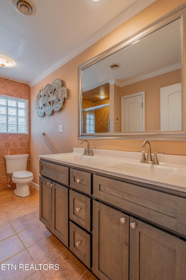 150 Ray Cross Rd, Harriman, TN 37748 - bathroom with double vanity, crown molding, tile patterned floors, a shower, and tile walls