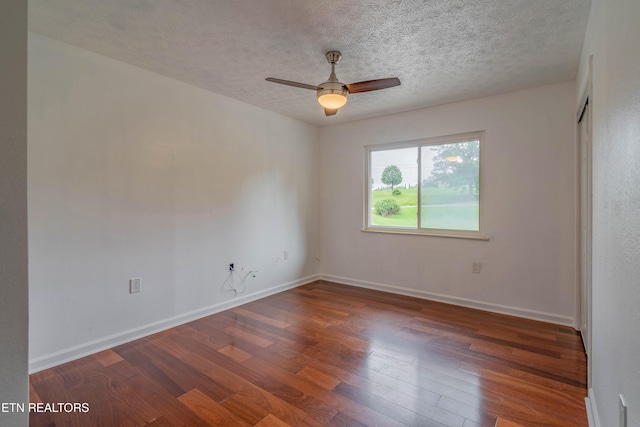 150 Ray Cross Rd, Harriman, TN 37748 - spare room featuring wood finished floors, a textured ceiling, and a ceiling fan