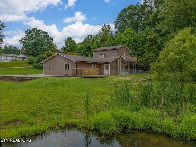 150 Ray Cross Rd, Harriman, TN 37748 - back of property featuring a deck and a lawn