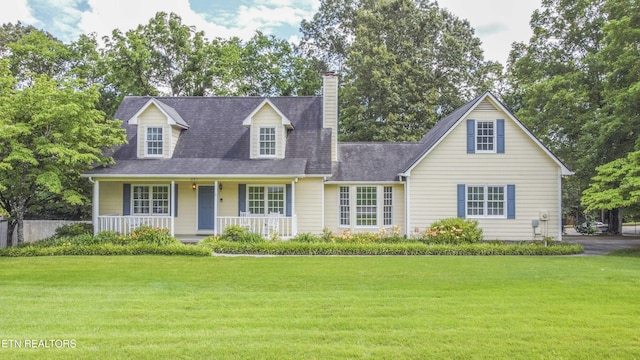 228 Wells Fargo Dr Unit 2, Knoxville, TN 37934 - cape cod house with a porch, a front lawn, a chimney, and roof with shingles