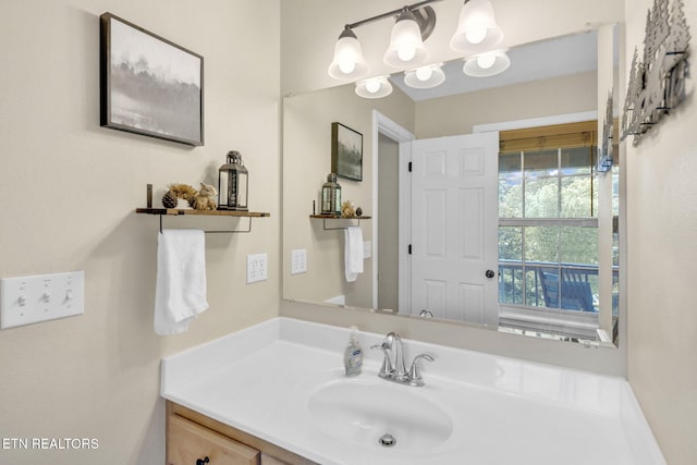 3183 Wears Dr, Sevierville, TN 37862 - bathroom with vanity and a chandelier