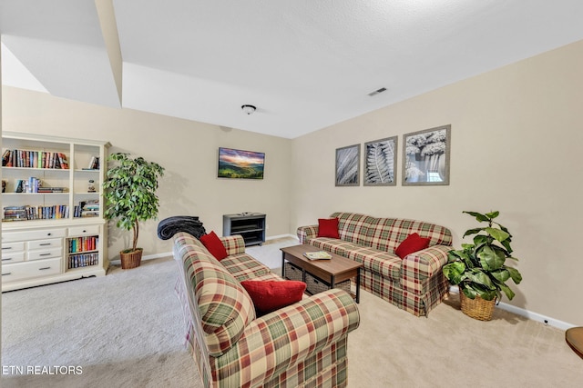 3183 Wears Dr, Sevierville, TN 37862 - carpeted living room featuring baseboards