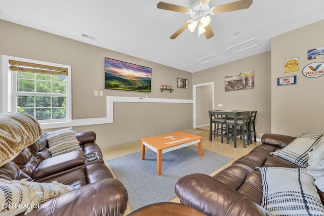 3183 Wears Dr, Sevierville, TN 37862 - living room featuring ceiling fan and attic access