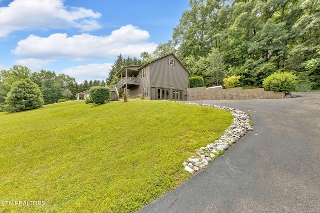 3183 Wears Dr, Sevierville, TN 37862 - view of front of home with driveway, stairway, and a front lawn