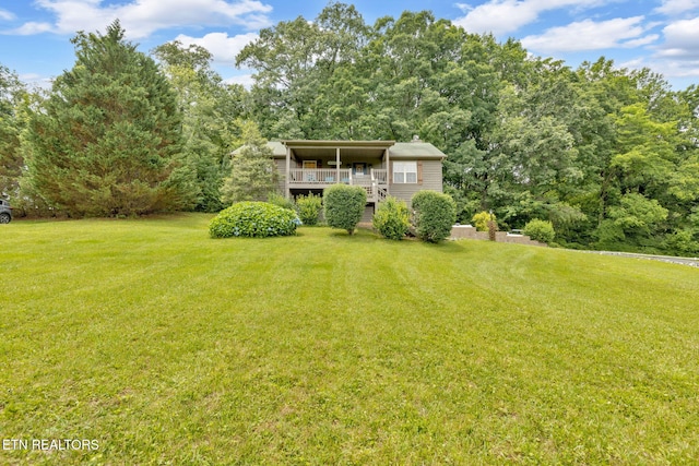3183 Wears Dr, Sevierville, TN 37862 - view of green lawn featuring a wooden deck