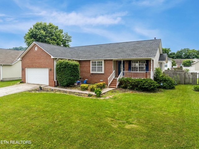 541 Pebble Creek Rd, Knoxville, TN 37918 - view of front of house with brick siding, a porch, driveway, a garage, and roof with shingles