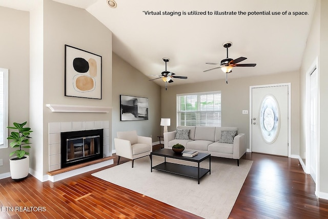 541 Pebble Creek Rd, Knoxville, TN 37918 - living area featuring dark wood-type flooring, a glass covered fireplace, vaulted ceiling, and ceiling fan