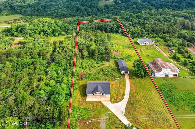 1570 W Dumplin Valley Rd, Dandridge, TN 37725 - aerial view of property's location with a heavily wooded area and property boundaries highlighted