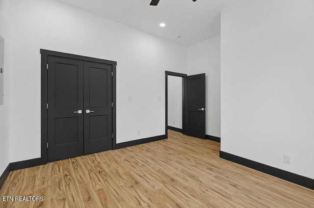 1570 W Dumplin Valley Rd, Dandridge, TN 37725 - unfurnished bedroom featuring light wood-type flooring and ceiling fan