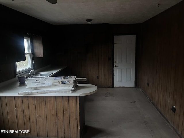 332 Ridge Rd, Lancing, TN 37770 - bathroom with wood walls and concrete floors