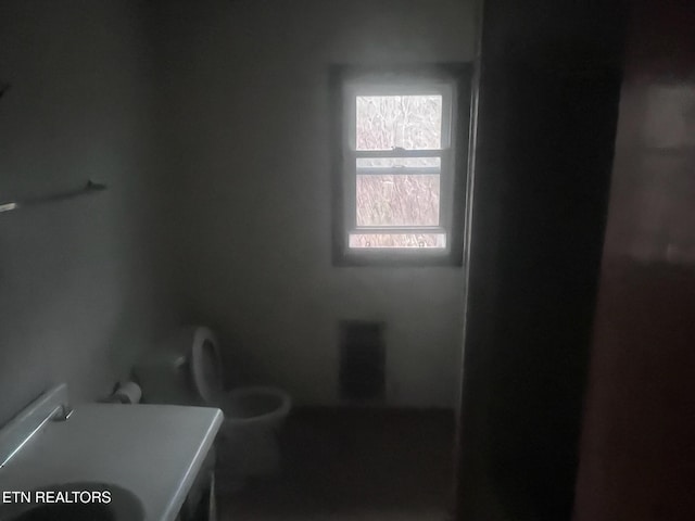 332 Ridge Rd, Lancing, TN 37770 - bathroom featuring toilet and vanity