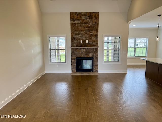 2107 Lantern Park Ln, Knoxville, TN 37932 - unfurnished living room featuring dark wood-style flooring and a fireplace