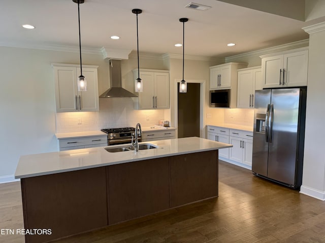 2107 Lantern Park Ln, Knoxville, TN 37932 - kitchen with stainless steel refrigerator with ice dispenser, wall chimney range hood, white cabinets, crown molding, and recessed lighting
