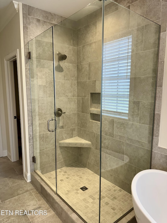 2107 Lantern Park Ln, Knoxville, TN 37932 - bathroom featuring a soaking tub and a stall shower