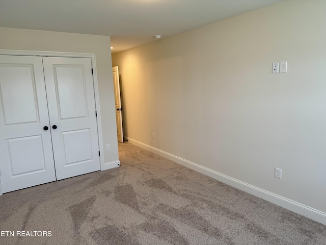 2107 Lantern Park Ln, Knoxville, TN 37932 - unfurnished bedroom featuring carpet flooring and a closet