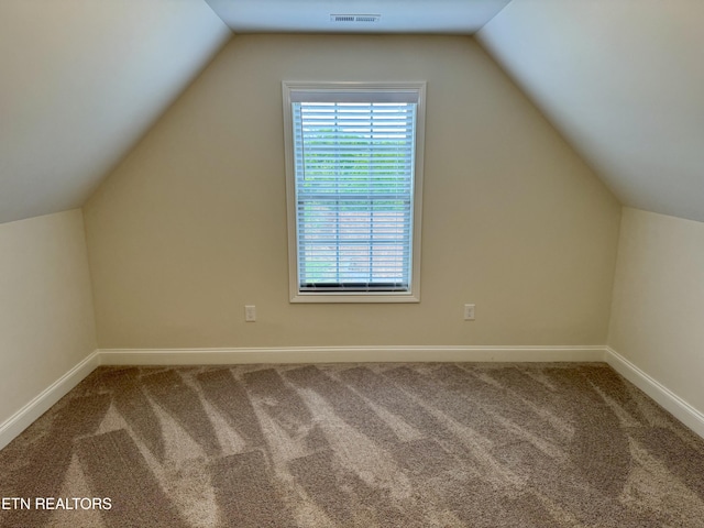 2107 Lantern Park Ln, Knoxville, TN 37932 - additional living space featuring carpet floors and vaulted ceiling
